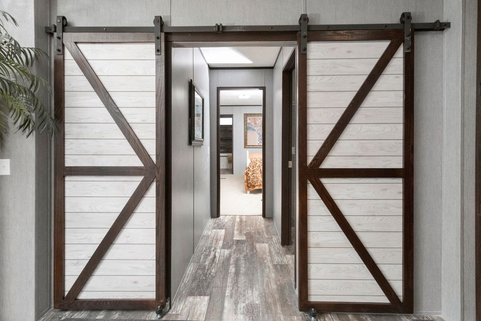 The THE SEASIDE Den. This Manufactured Mobile Home features 3 bedrooms and 2 baths.