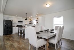 The CERISE Dining Area. This Manufactured Mobile Home features 4 bedrooms and 2 baths.