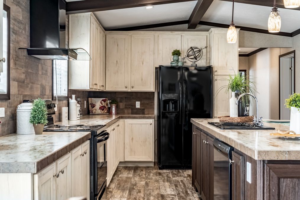 The THE TYRA Kitchen. This Manufactured Mobile Home features 4 bedrooms and 2 baths.