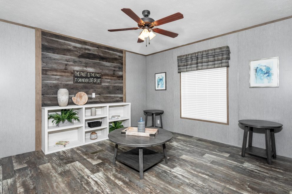 The THE MORRIS Den. This Manufactured Mobile Home features 3 bedrooms and 2 baths.