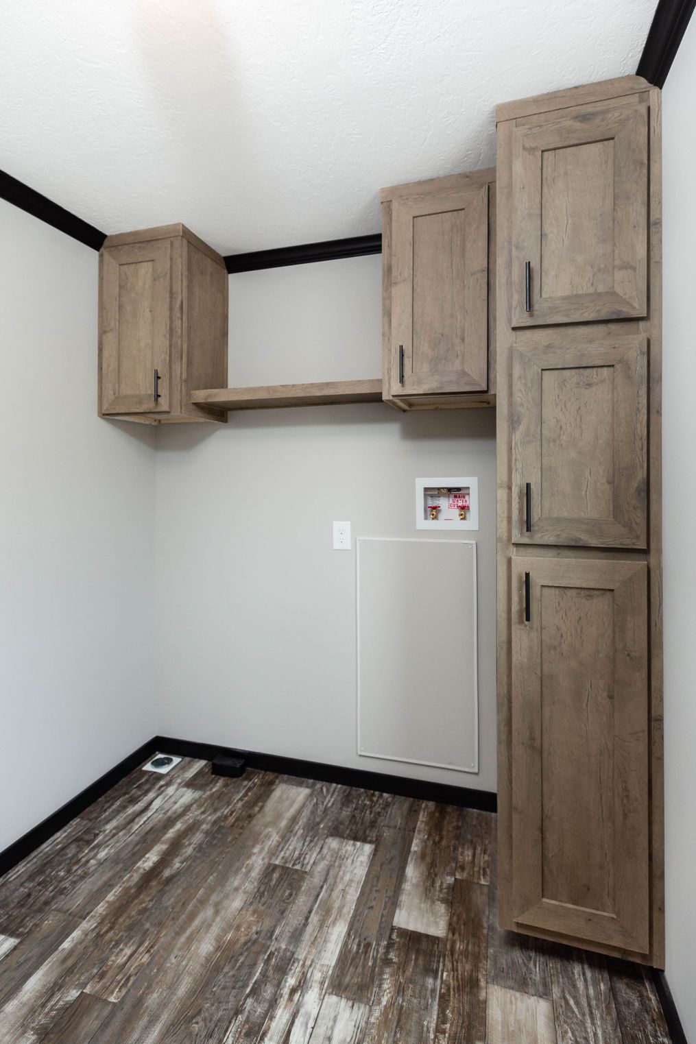 The BOUJEE XL Utility Room. This Manufactured Mobile Home features 4 bedrooms and 3 baths.