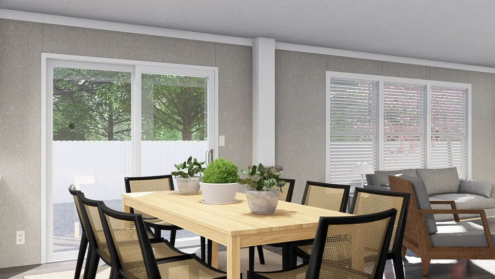 The THE FUSION 32H Dining Room. This Manufactured Mobile Home features 5 bedrooms and 3 baths.