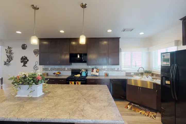 The SUM3068A Kitchen. This Manufactured Mobile Home features 3 bedrooms and 2 baths.