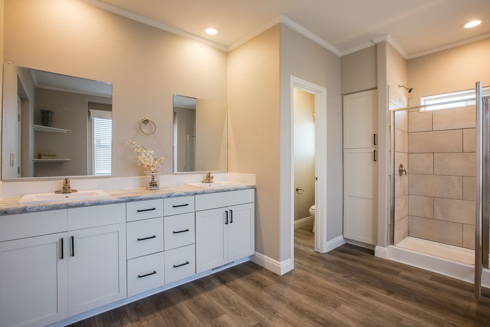 The EDGEWOOD Primary Bathroom. This Manufactured Mobile Home features 3 bedrooms and 2 baths.