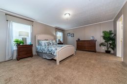 The BLACKJACK 32' Master Bedroom. This Manufactured Mobile Home features 4 bedrooms and 2 baths.