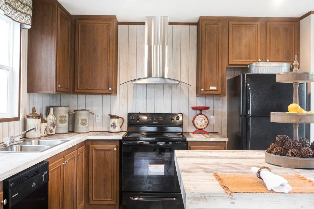 The THE LODGE Kitchen. This Manufactured Mobile Home features 2 bedrooms and 2 baths.