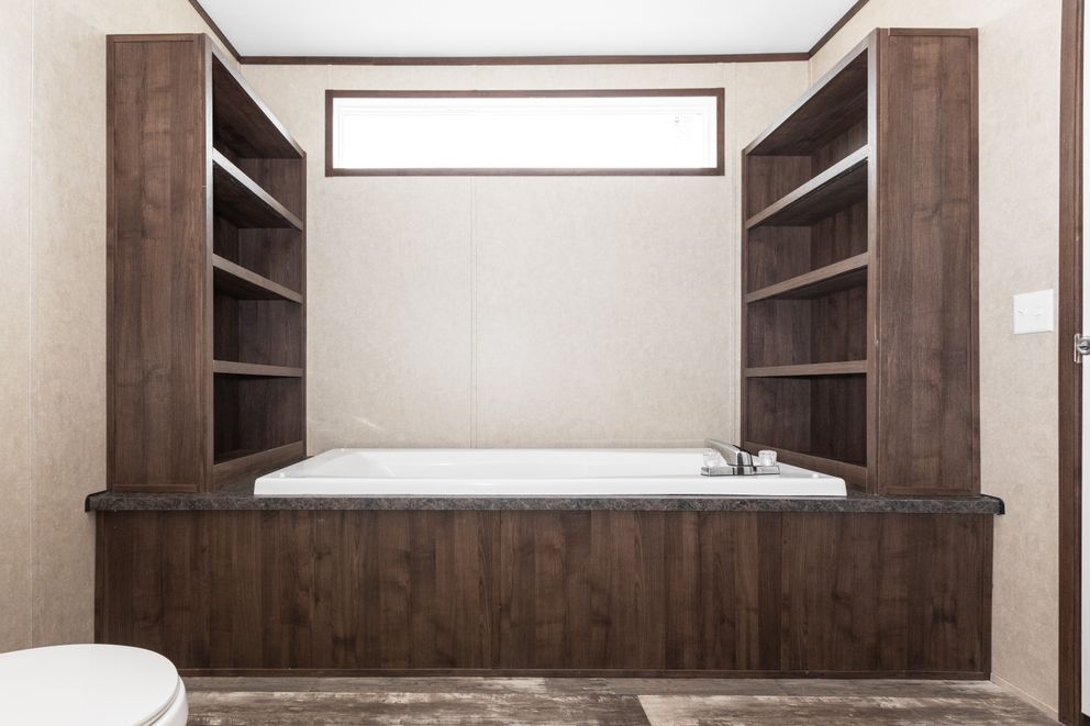The THE RIVERWAY Primary Bathroom. This Manufactured Mobile Home features 4 bedrooms and 2 baths.