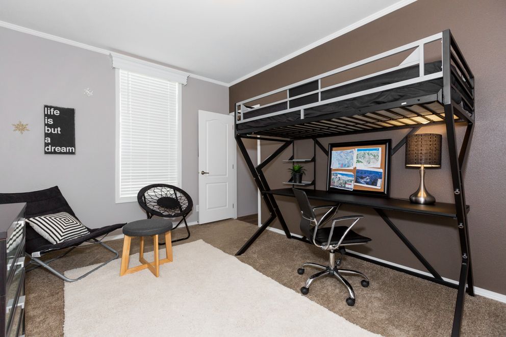 The ENCHANTMENT 3070A Bedroom. This Manufactured Mobile Home features 3 bedrooms and 2 baths.