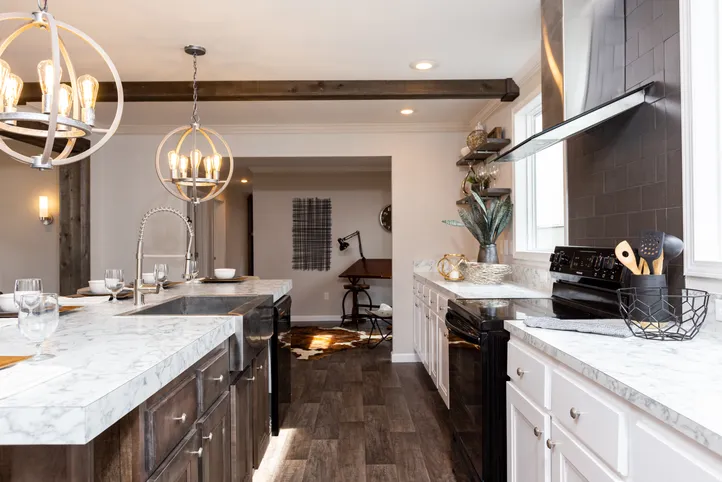 The THE FREEDOM SOHO Kitchen. This Manufactured Mobile Home features 3 bedrooms and 2 baths.