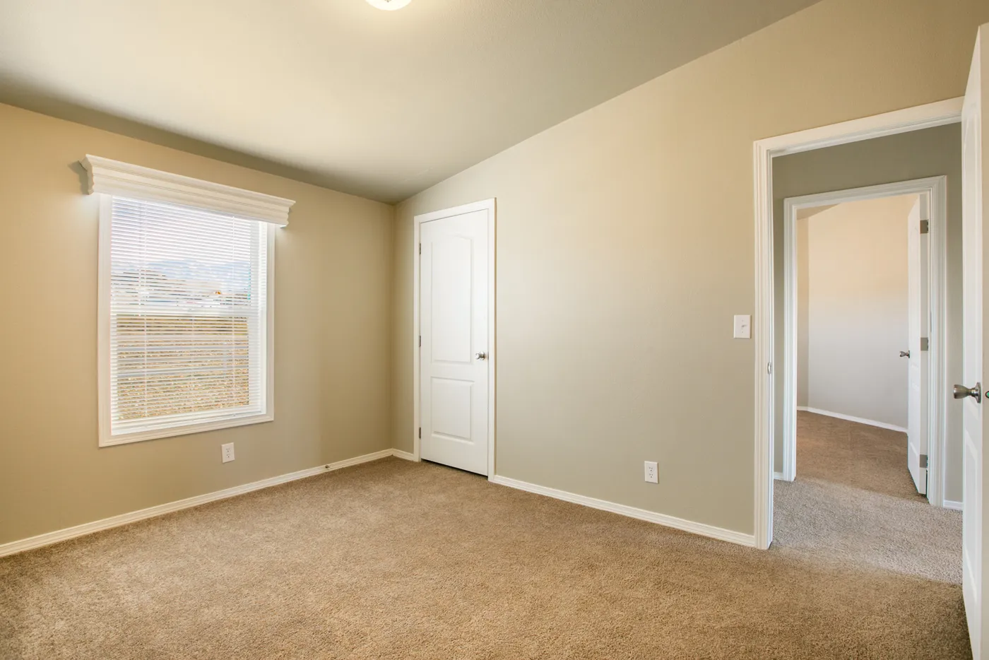 The THE WAVE Guest Bedroom. This Manufactured Mobile Home features 4 bedrooms and 2 baths.