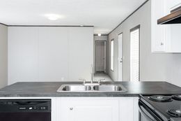 The BLAZER 76 4A Kitchen. This Manufactured Mobile Home features 4 bedrooms and 2 baths.