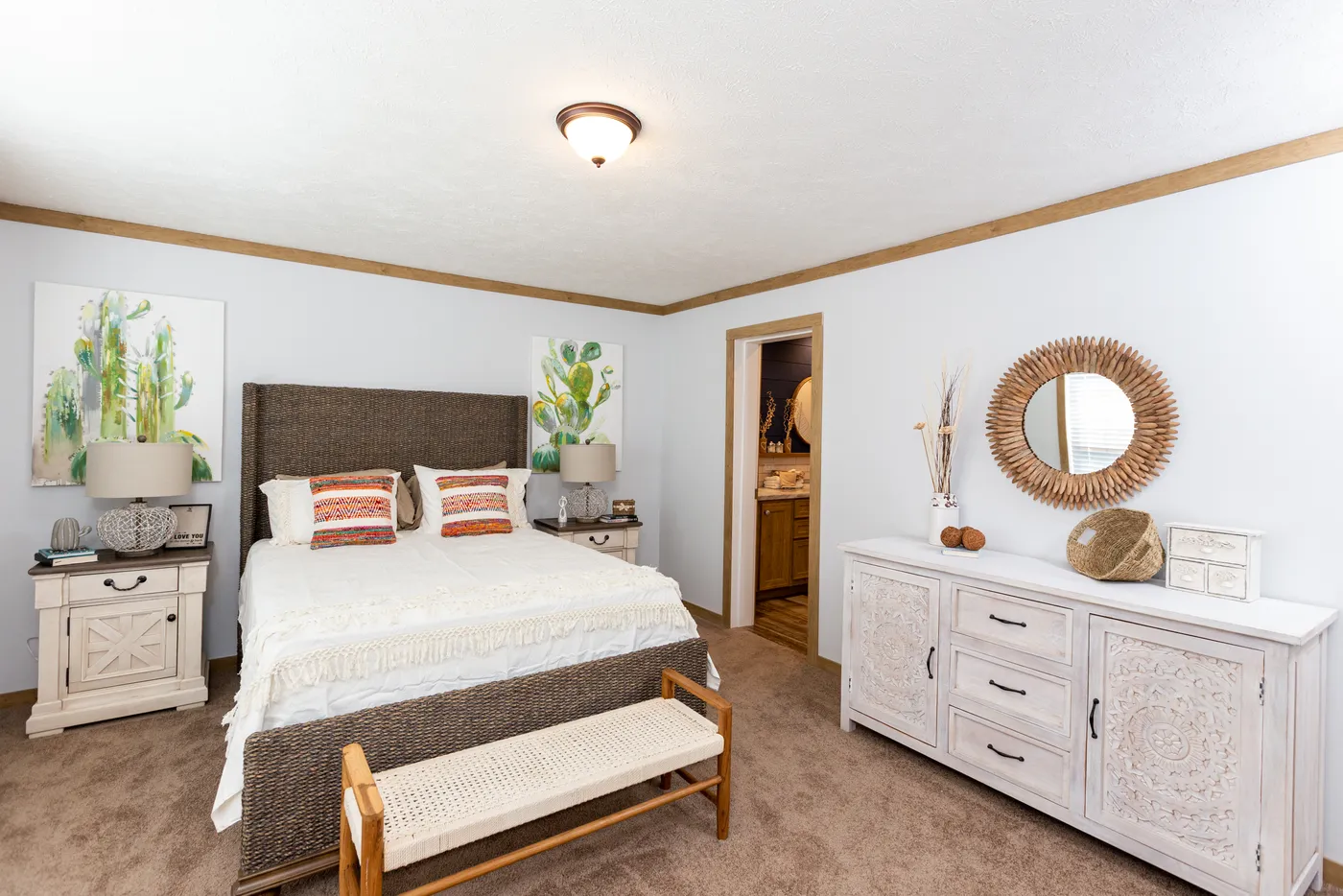 The THE KIMMEL Primary Bedroom. This Manufactured Mobile Home features 3 bedrooms and 2 baths.