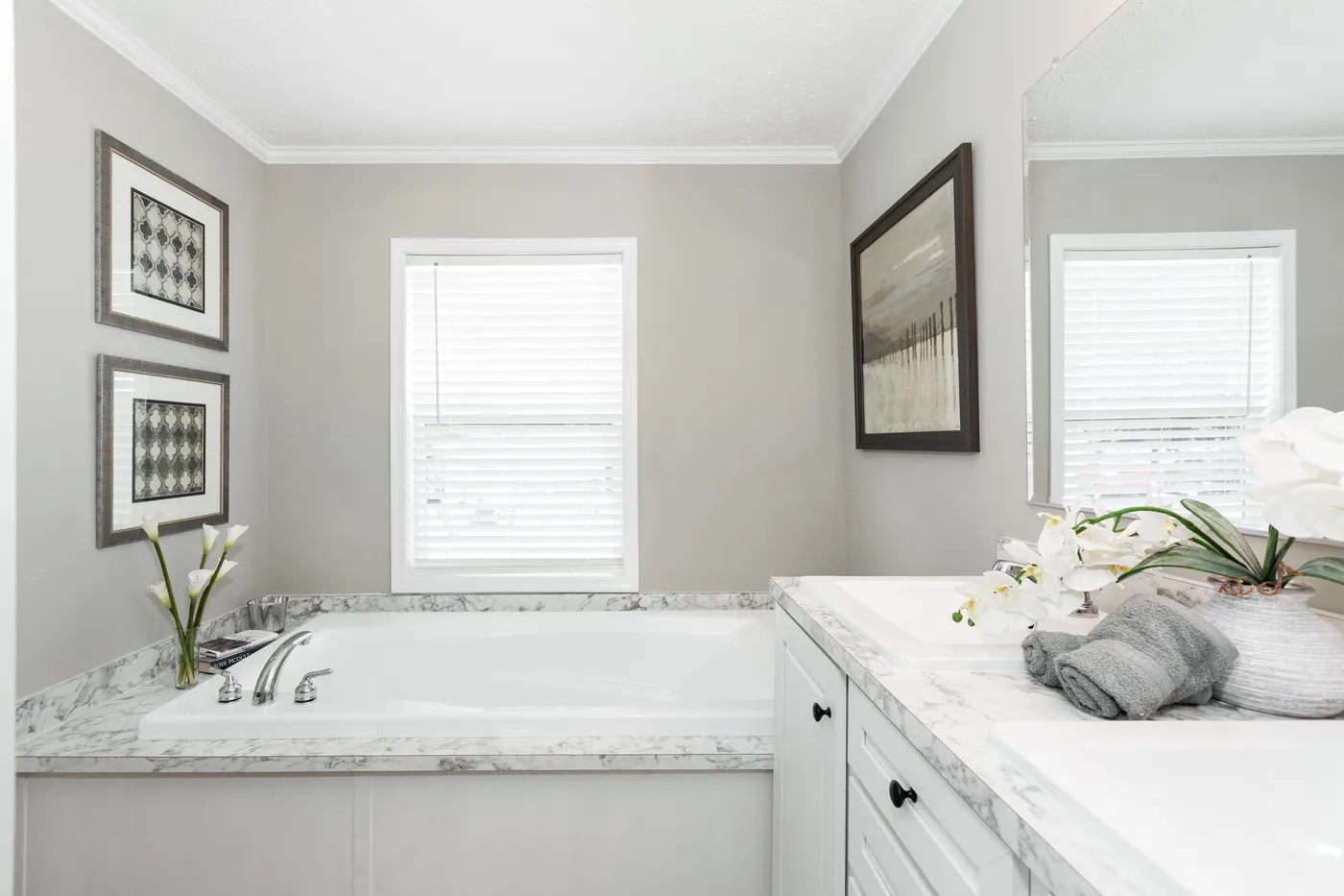 The 777 "COOL BREEZE" 7616 Primary Bathroom. This Manufactured Mobile Home features 3 bedrooms and 2 baths.