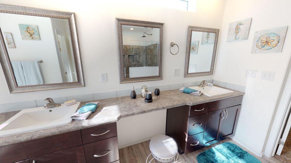 The SUM3068A Primary Bathroom. This Manufactured Mobile Home features 3 bedrooms and 2 baths.