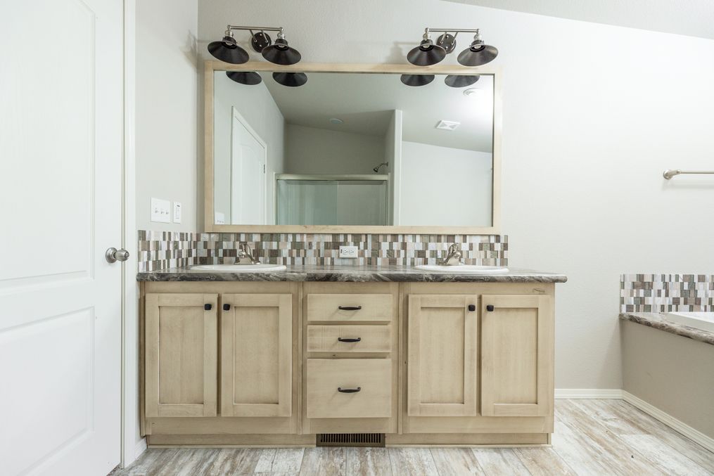 The 2860 MARLETTE SPECIAL Primary Bathroom. This Manufactured Mobile Home features 3 bedrooms and 2 baths.