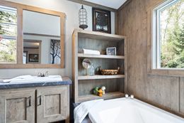 The COUNTRY COTTAGE Master Bathroom. This Manufactured Mobile Home features 3 bedrooms and 2 baths.