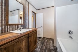 The THE CORNERBACK Master Bathroom. This Manufactured Mobile Home features 2 bedrooms and 1 bath.