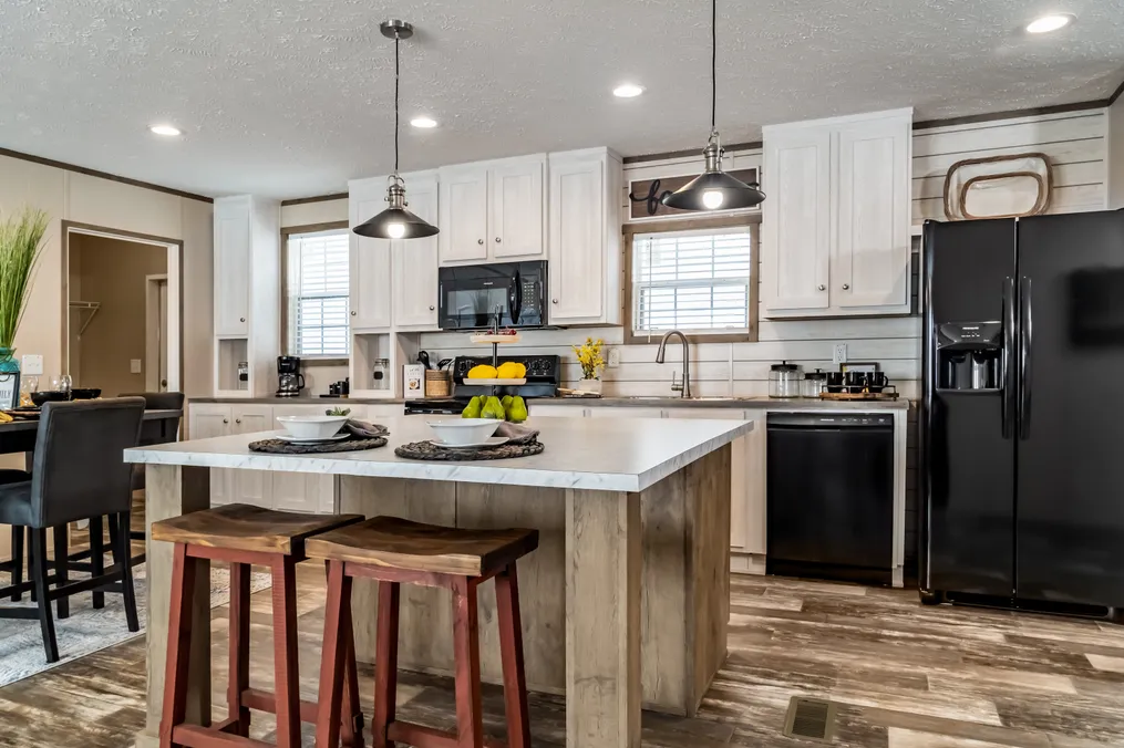 The ULTRA PRO 56B Kitchen. This Manufactured Mobile Home features 3 bedrooms and 2 baths.