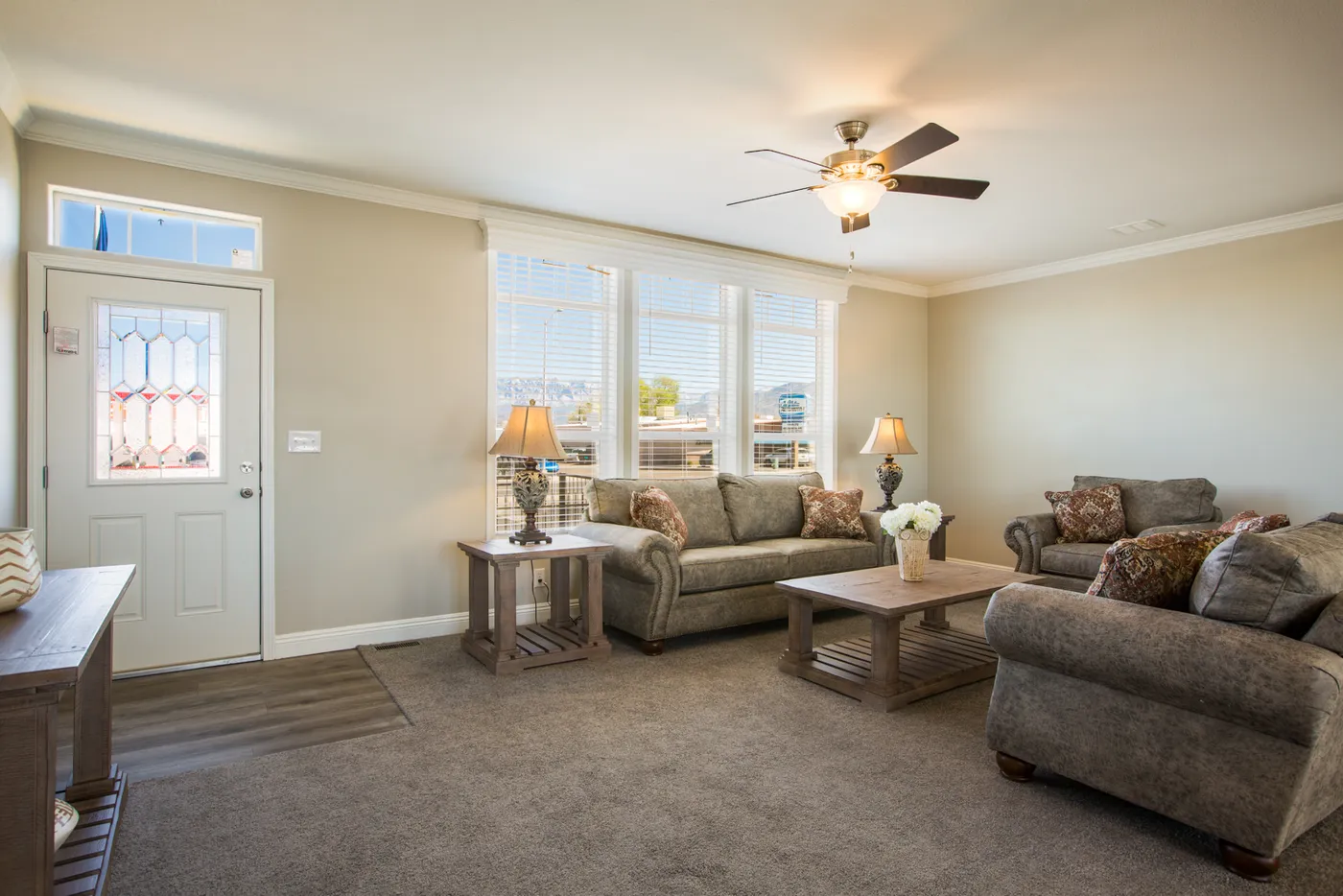 The EDGEWOOD Living Room. This Manufactured Mobile Home features 3 bedrooms and 2 baths.
