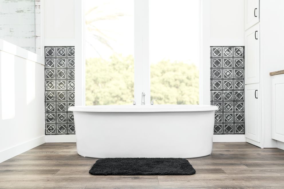 The 1440 CAROLINA 4BR BELLE Primary Bathroom. This Manufactured Mobile Home features 4 bedrooms and 2 baths.