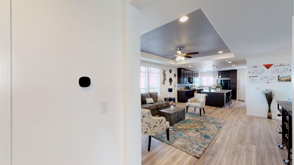 The SUM3068A Living Room. This Manufactured Mobile Home features 3 bedrooms and 2 baths.