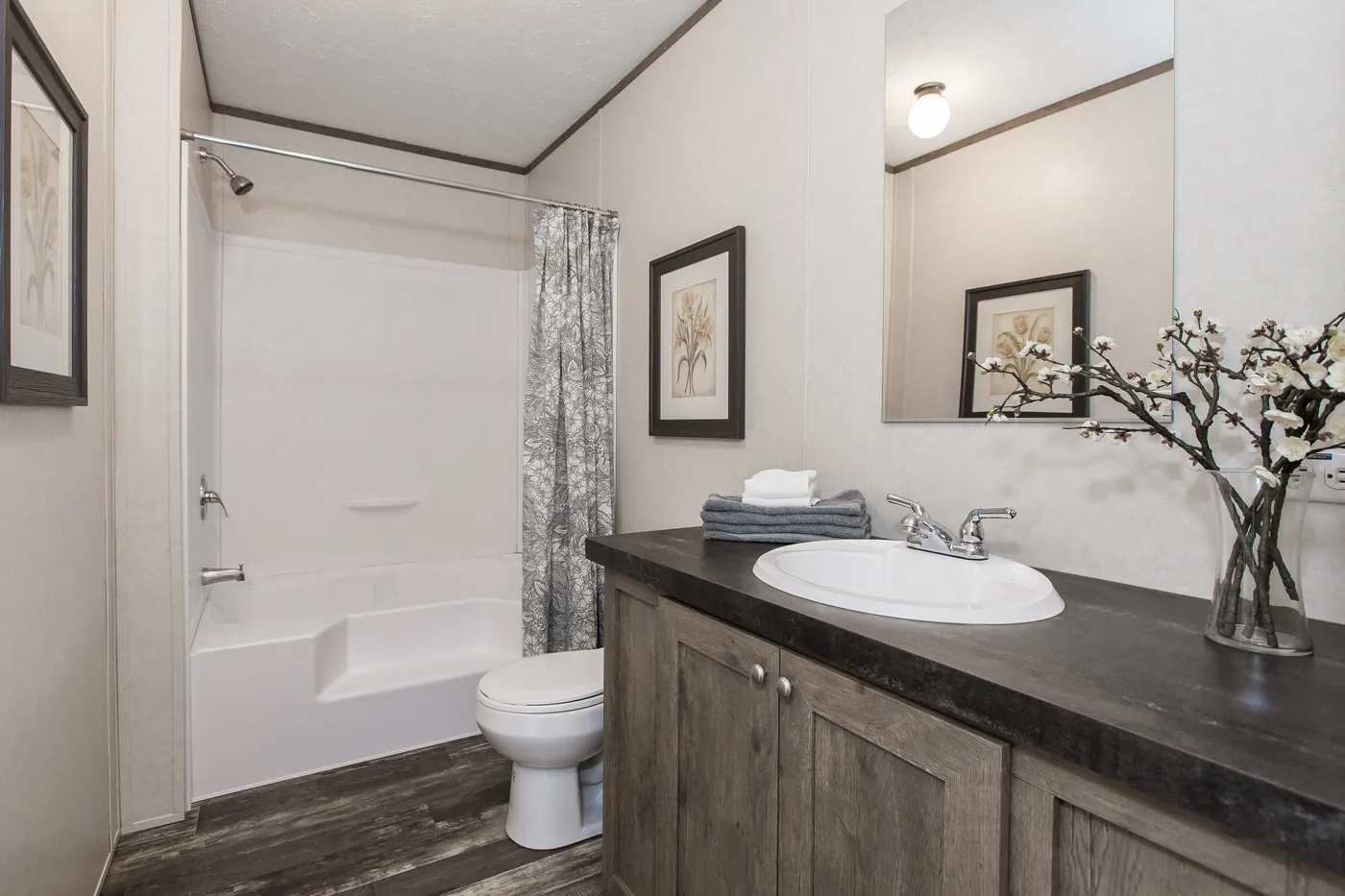 The THE BREEZE Primary Bathroom. This Manufactured Mobile Home features 3 bedrooms and 2 baths.