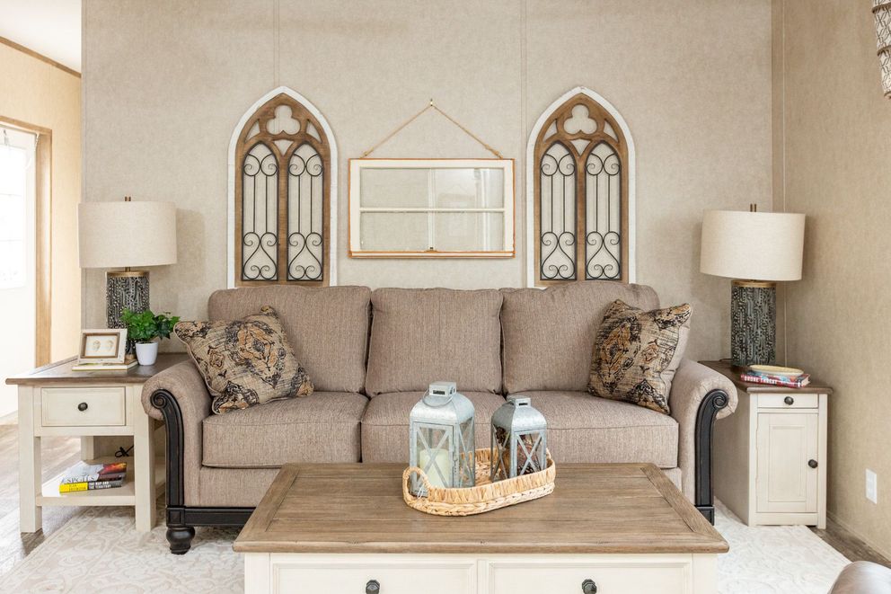 The THE RANCH HOUSE Living Room. This Manufactured Mobile Home features 3 bedrooms and 2 baths.