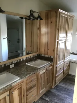 The 2022 COLUMBIA RIVER Primary Bathroom. This Manufactured Mobile Home features 3 bedrooms and 2 baths.