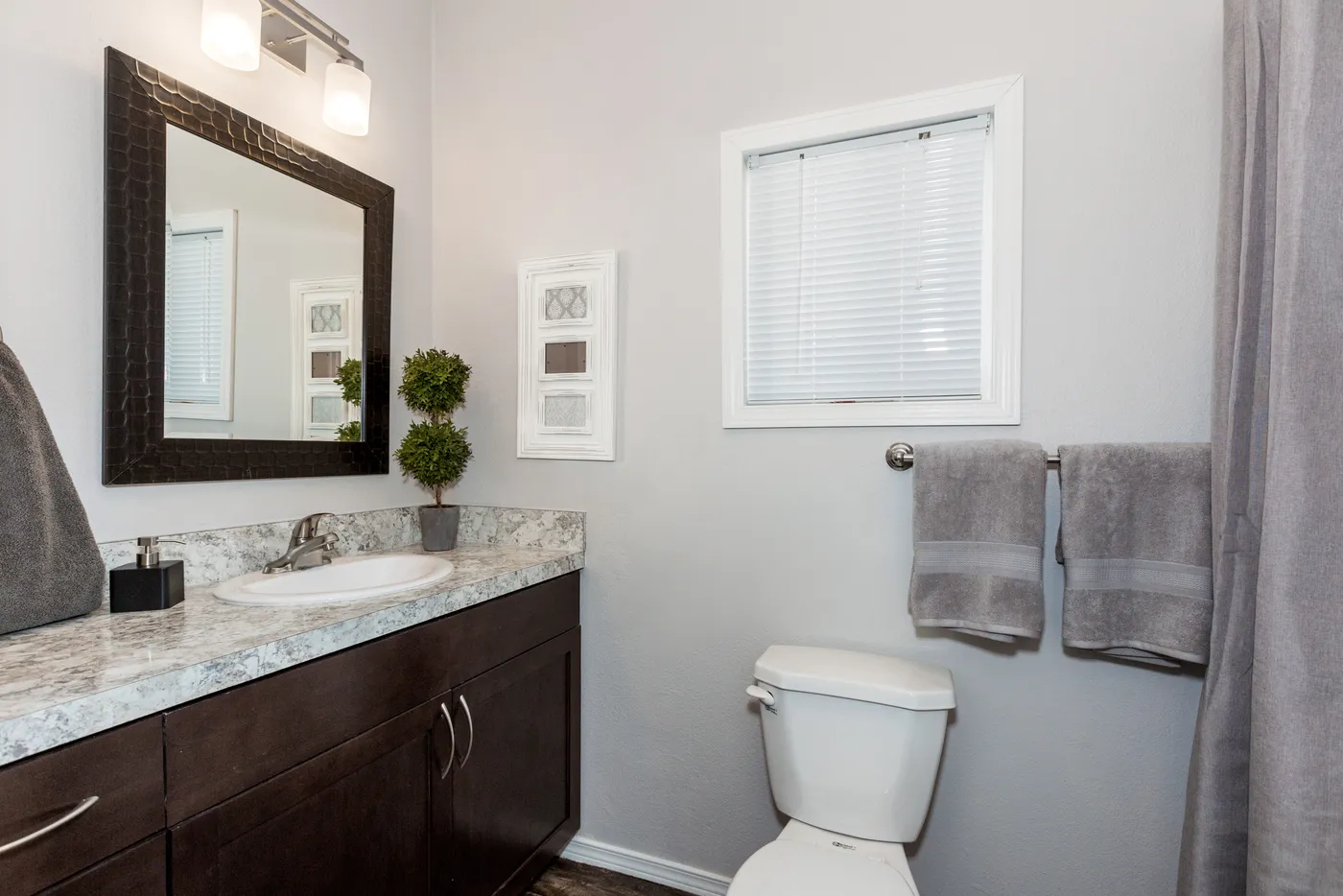 The K1640A Primary Bathroom. This Manufactured Mobile Home features 1 bedroom and 1 bath.