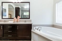 The GLE661K Master Bathroom. This Manufactured Mobile Home features 3 bedrooms and 2 baths.