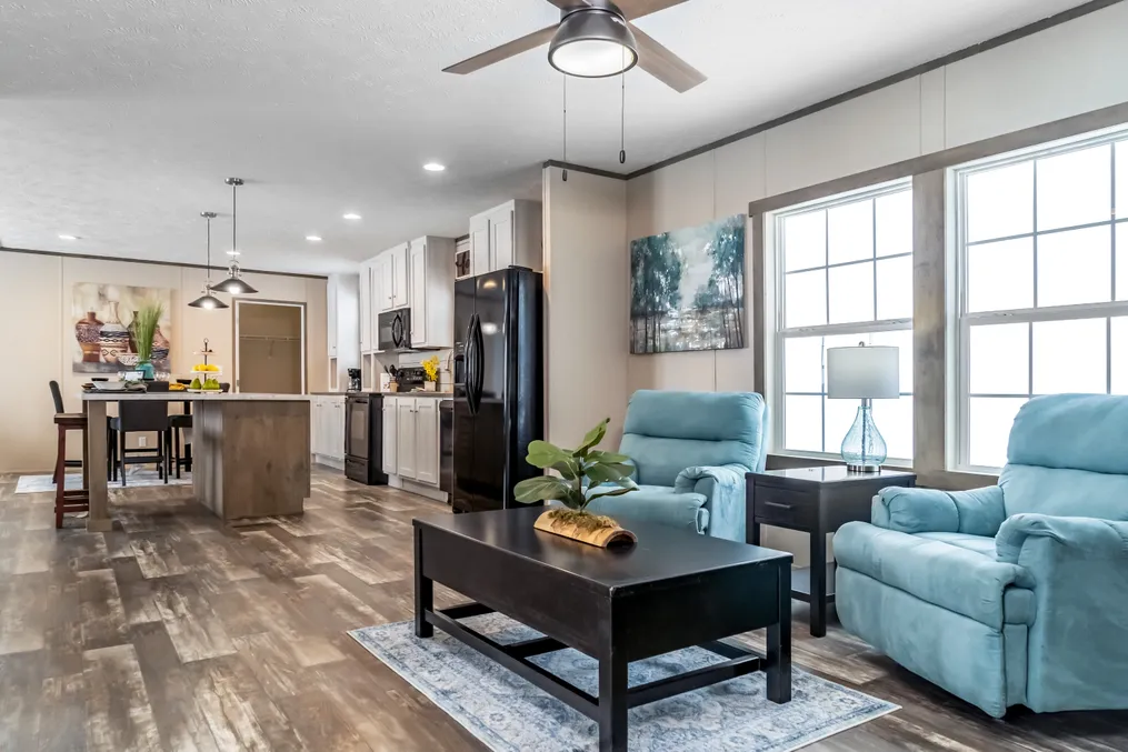 The ULTRA PRO 56B Living Room. This Manufactured Mobile Home features 3 bedrooms and 2 baths.