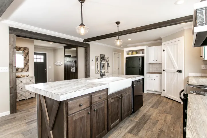The FREEDOM FARM HOUSE  32X60 Kitchen. This Manufactured Mobile Home features 3 bedrooms and 2 baths.