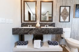 The THE HAMPTON BAY Primary Bathroom. This Manufactured Mobile Home features 3 bedrooms and 2 baths.