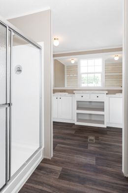 The ISLAND BREEZE Primary Bathroom. This Manufactured Mobile Home features 3 bedrooms and 2 baths.