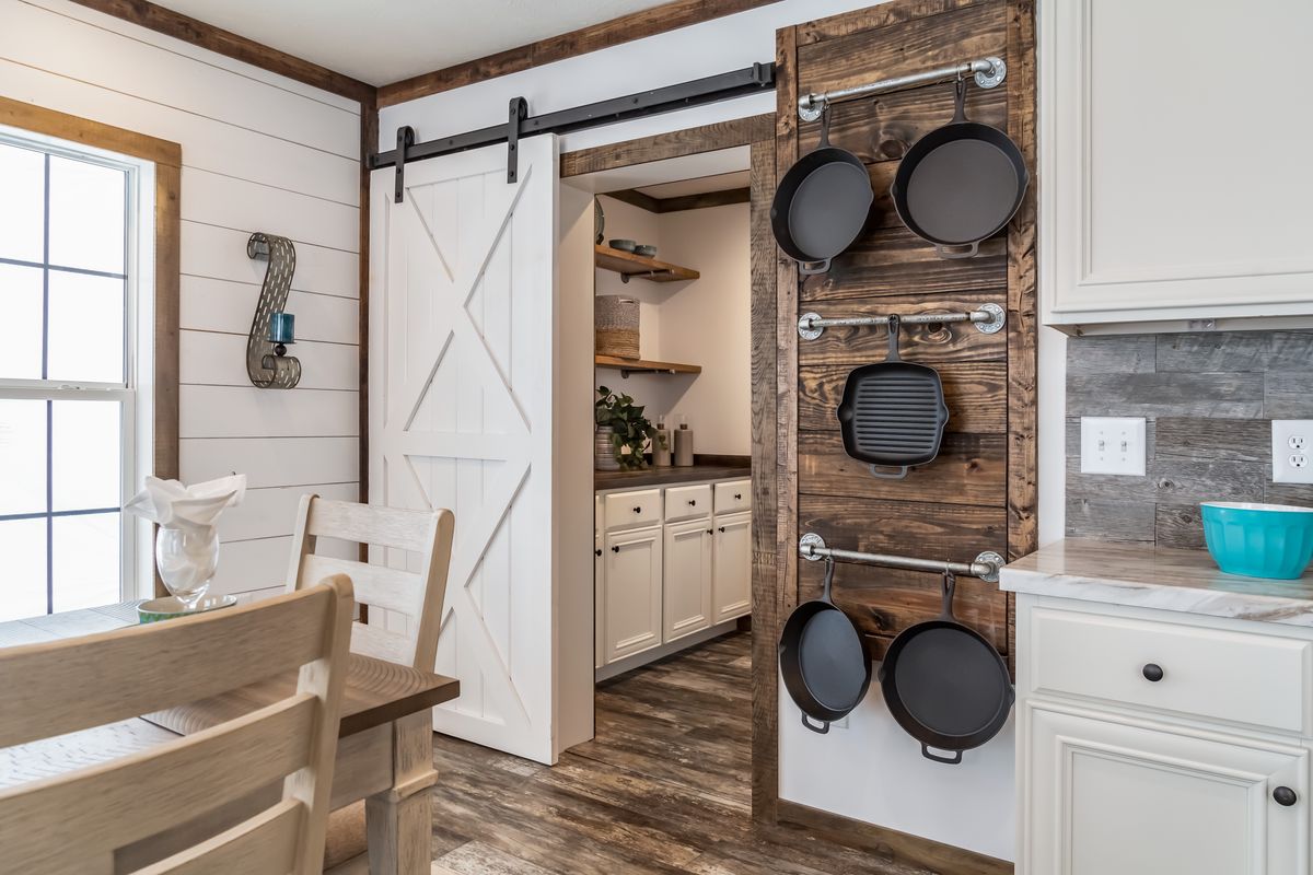 The THE EMMA JEAN Kitchen. This Manufactured Mobile Home features 4 bedrooms and 3 baths.