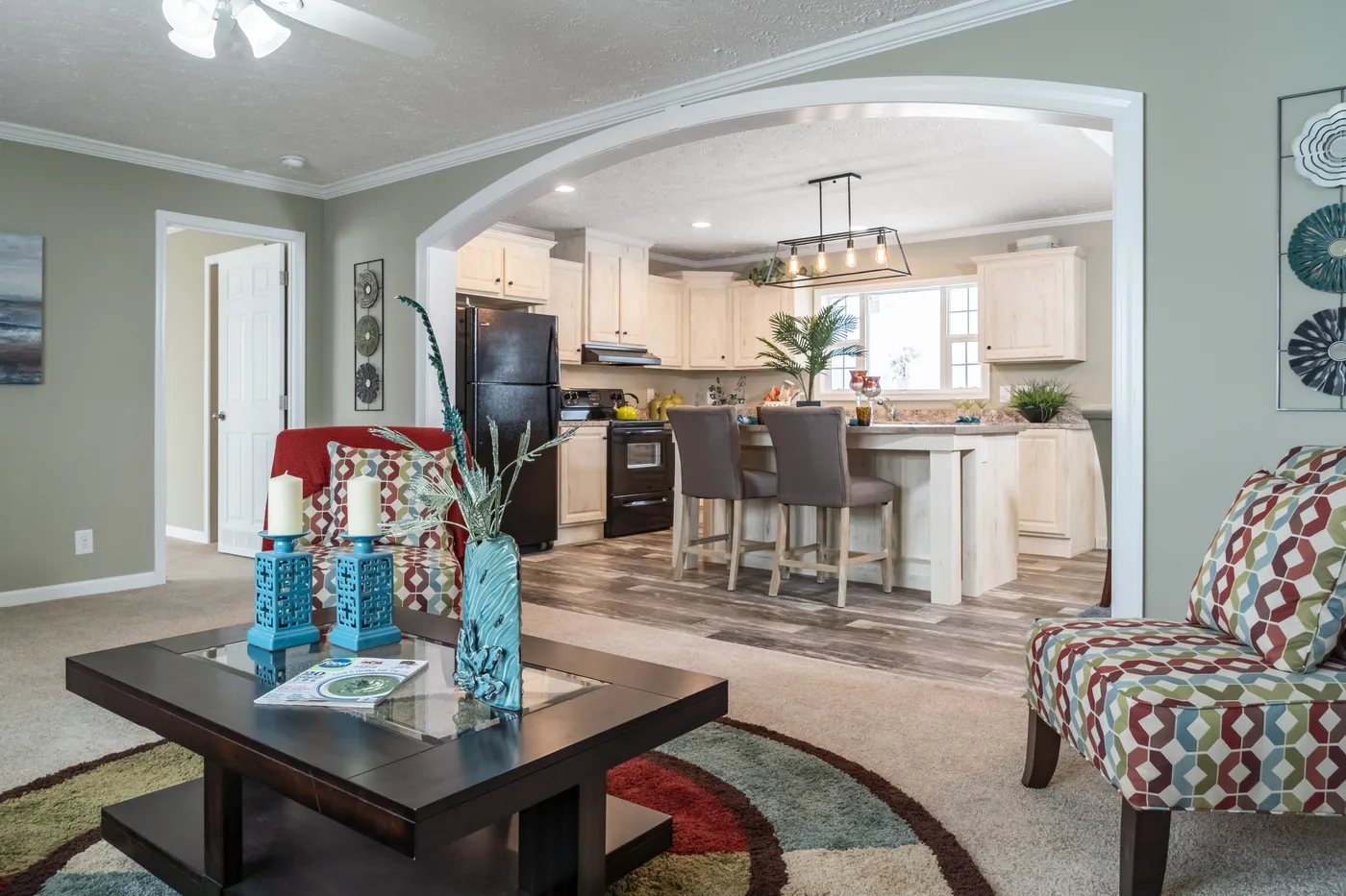 The 4608 ROCKETEER 5628 Living Room. This Manufactured Mobile Home features 3 bedrooms and 2 baths.