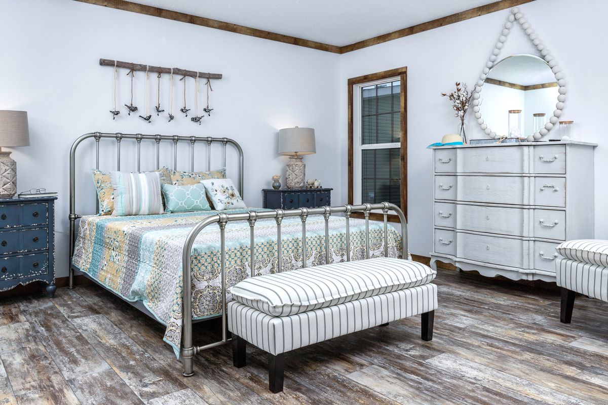 The THE LIZA JANE Master Bedroom. This Manufactured Mobile Home features 3 bedrooms and 2 baths.