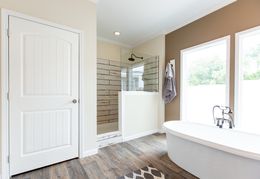 The SOUTHERN CHARM Master Bathroom. This Manufactured Mobile Home features 3 bedrooms and 2 baths.