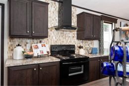 The MILANO 8016-1956 Kitchen. This Manufactured Mobile Home features 3 bedrooms and 2 baths.