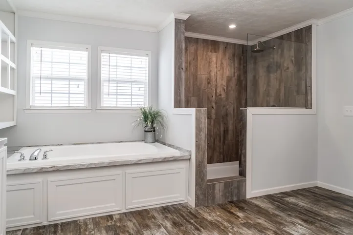 The THE LEAHY Primary Bathroom. This Manufactured Mobile Home features 4 bedrooms and 2 baths.