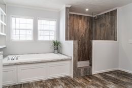 The THE LEAHY Master Bathroom. This Manufactured Mobile Home features 4 bedrooms and 2 baths.