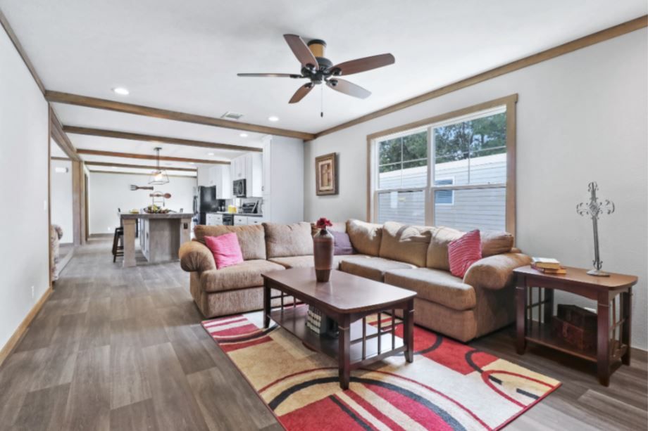The NELLIE Family Room. This Manufactured Mobile Home features 4 bedrooms and 2 baths.