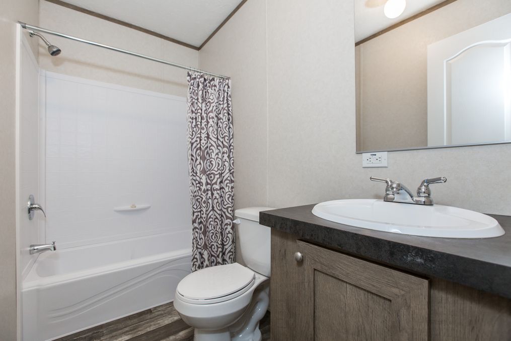 The THE BREEZE Master Bathroom. This Manufactured Mobile Home features 3 bedrooms and 2 baths.