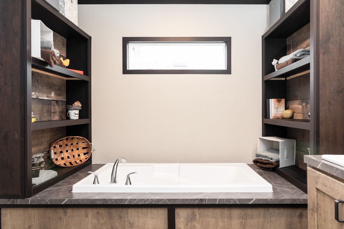 The BOUJEE Master Bathroom. This Manufactured Mobile Home features 3 bedrooms and 2 baths.