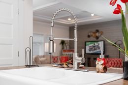 The 1439 CAROLINA "MAGNOLIA" Kitchen. This Manufactured Mobile Home features 3 bedrooms and 2 baths.
