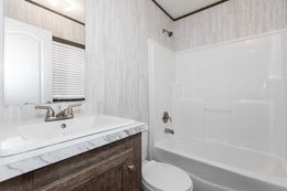 The BLAZER 66 B Guest Bathroom. This Manufactured Mobile Home features 3 bedrooms and 2 baths.