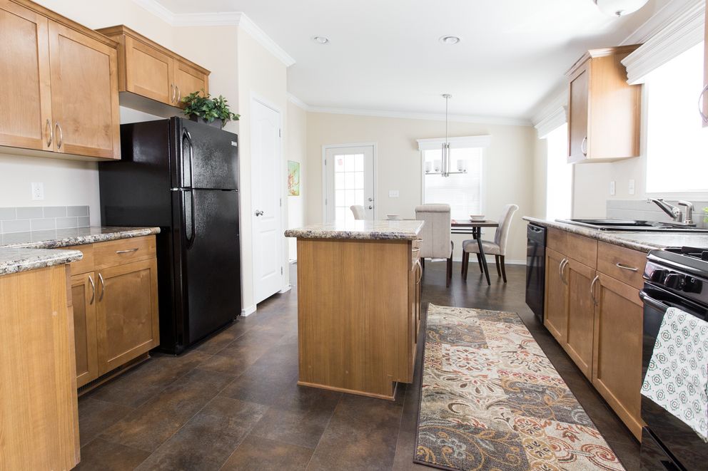 The K2750A Kitchen. This Manufactured Mobile Home features 3 bedrooms and 2 baths.