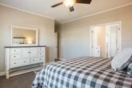 The EDGEWOOD Master Bedroom. This Manufactured Mobile Home features 3 bedrooms and 2 baths.