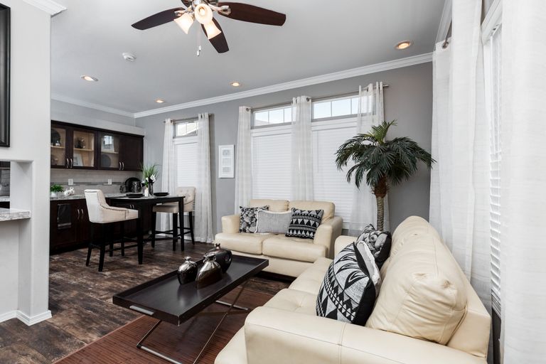 The K1640A Living Room. This Manufactured Mobile Home features 1 bedroom and 1 bath.