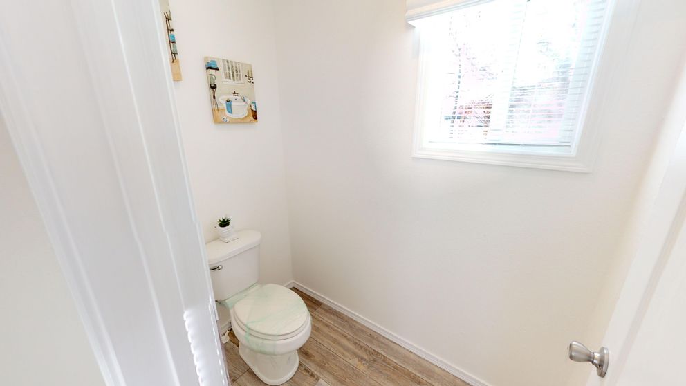 The SUM3068A Primary Bathroom. This Manufactured Mobile Home features 3 bedrooms and 2 baths.